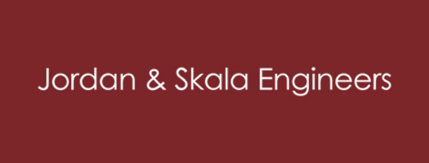 Burgundy-colored background image and white-colored logo of Jordan & Skala Engineers: MEP, Sustainability, and Low Voltage Design Consultants.