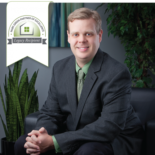 Headshot of Aaron McEwin with a white banner at the top right reading "NGBS Legacy Partner."